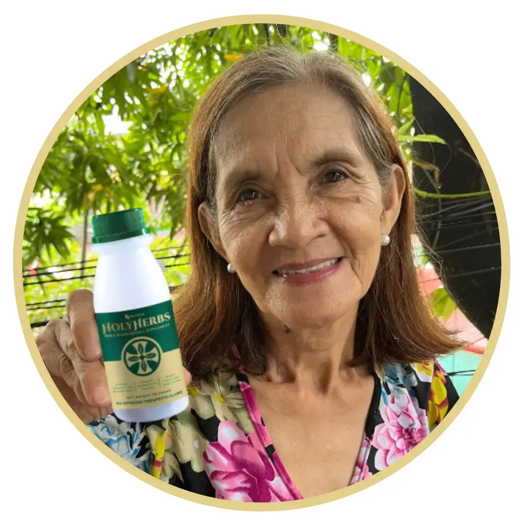 Lina - Holy herbs advocate smiling at the camera showing the holy herbs bottle