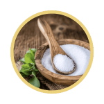 Stevia powder in a wooden bowl with a spoon